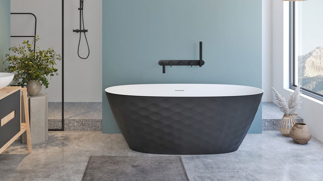 a black and white bathtub in a bathroom