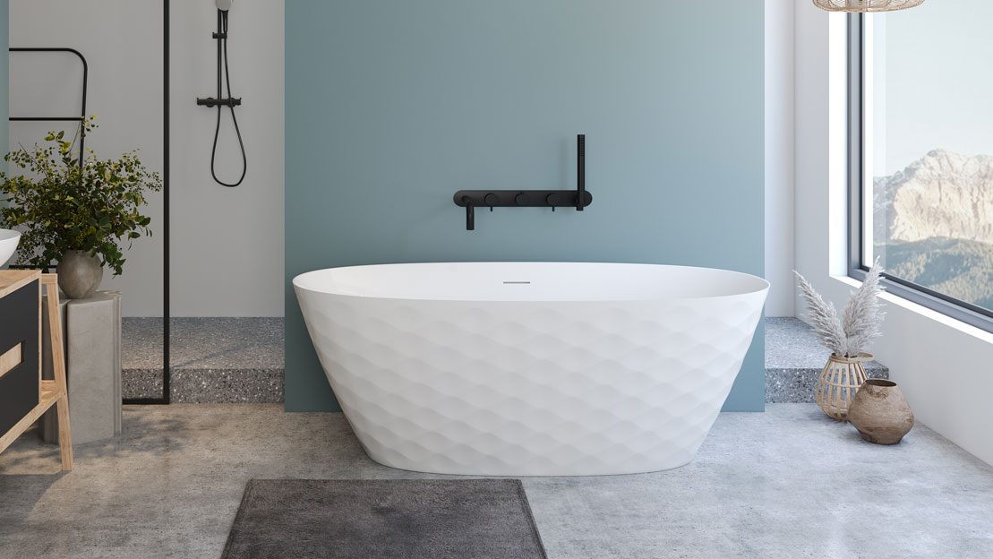 a white bathtub in a bathroom