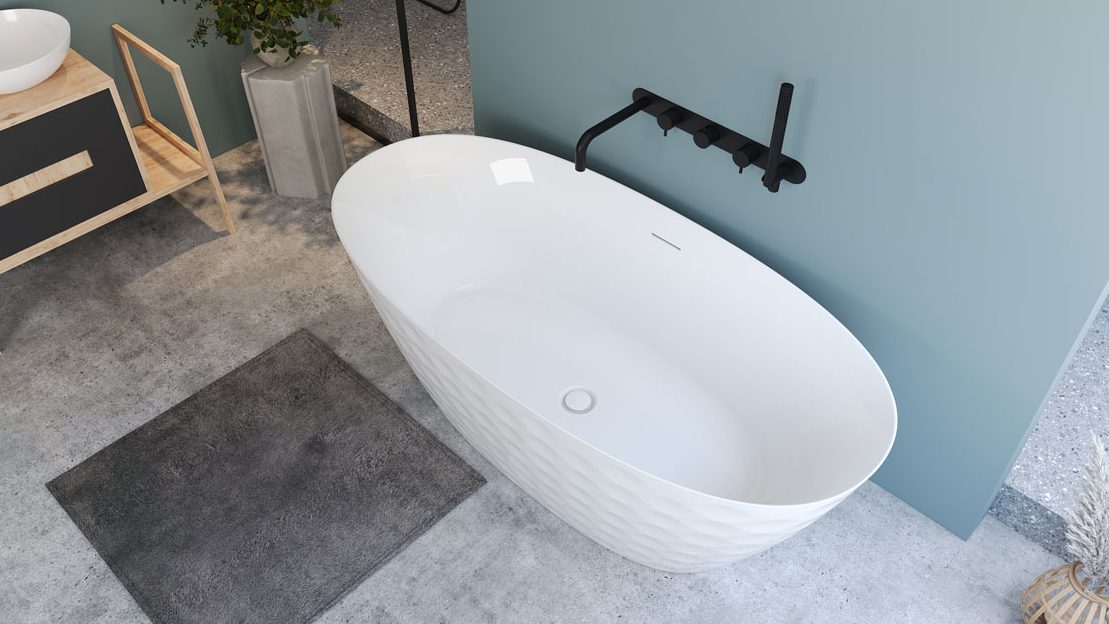 a white bathtub in a bathroom